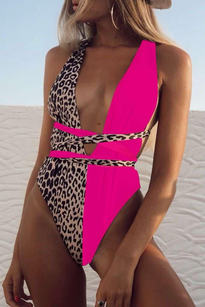 Enteriza Geor Animal print y fucsia