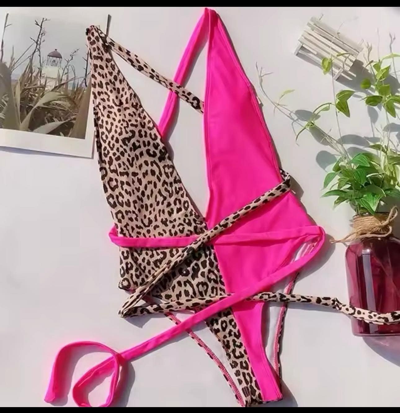 Enteriza Geor Animal print y fucsia