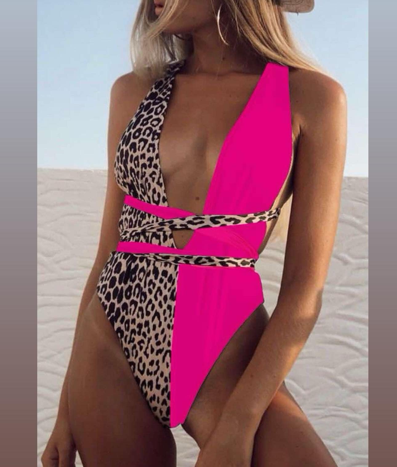 Enteriza Geor Animal print y fucsia